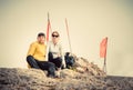 Man and Woman couple Travelers on Mountain summit Royalty Free Stock Photo