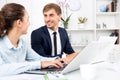 Man and woman coworkers working on computers Royalty Free Stock Photo