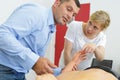 man and woman on cpr first aid training course Royalty Free Stock Photo