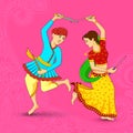 Man and woman dancing on Dandiya night Royalty Free Stock Photo