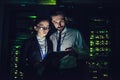 Man and woman in data centre Royalty Free Stock Photo