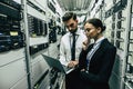 Man and woman in data centre