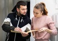 Man and woman discussing rental agreement Royalty Free Stock Photo