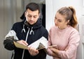 Man and woman discussing rental agreement Royalty Free Stock Photo