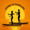 Man and woman do stand up paddling on water at sunset.