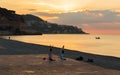 Man and woman doing gymnastics on the beach of Nice, France Royalty Free Stock Photo