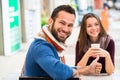 Man and woman drinking tea or coffee. Picnic. Drink warm in cool weather. Happy couple with coffee cups in autumn park. Love story Royalty Free Stock Photo