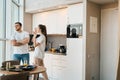 Man and a woman emotionally sort things out in kitchen Royalty Free Stock Photo