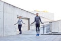 Man and woman exercising with jump-rope outdoors Royalty Free Stock Photo