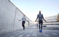 Man and woman exercising with jump-rope outdoors Royalty Free Stock Photo