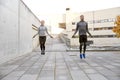 Man and woman exercising with jump-rope outdoors Royalty Free Stock Photo