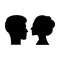 Man and woman face profile silhouette vector icon in a glyph pictogram Royalty Free Stock Photo