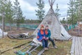 Man and woman, female saami, sami in national dress, saami village on the Kola Peninsula, Russia