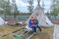 Man and woman, female saami, sami in national dress, saami village on the Kola Peninsula, Russia Royalty Free Stock Photo