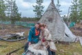 Man and woman, female saami, sami in national dress, saami village on the Kola Peninsula, Russia