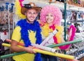 Man and woman in festive accessories shop Royalty Free Stock Photo