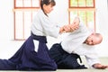 Man and woman fighting at Aikido martial arts school Royalty Free Stock Photo