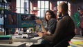 Man and woman filmmakers editing video shoot in post production Royalty Free Stock Photo