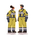 man woman firefighters in uniform emergency service happy labor day celebration concept vertical full length