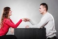 Man and woman first date. Handshake greeting. Royalty Free Stock Photo