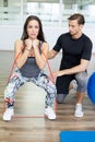 Man and woman in fitness club