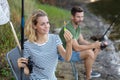 man and woman fly fishing in river Royalty Free Stock Photo