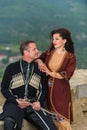 Man and woman in Georgian national dress.