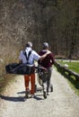 Man and woman golfer walking on a golf course Royalty Free Stock Photo