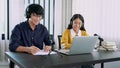 Man and woman guest recording podcast or interview each other for radio in studio together Royalty Free Stock Photo