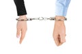 Man and woman hands and breaking handcuffs