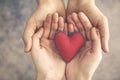 Man and woman hands together with red heart Royalty Free Stock Photo