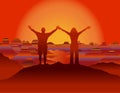 Man and woman with hands up standing on the top of mountain at sunset looking at beautiful landscape. Royalty Free Stock Photo