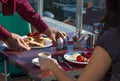 Man and Woman having Breakfast at outdoor Terrace of Hotel