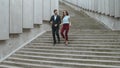 Man and woman having conversation outdoors. Workers having break with coffee Royalty Free Stock Photo