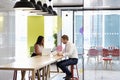 Man and woman having an informal meeting at work Royalty Free Stock Photo