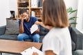 Man and woman having psychology session consueling patient at psychology clinic Royalty Free Stock Photo