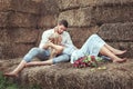 Man and woman in the hayloft. Royalty Free Stock Photo