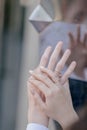 Man and woman hold hands close up