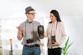 Man and woman hold retro camera Royalty Free Stock Photo