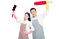 Man and woman holding cleaning supplies Royalty Free Stock Photo