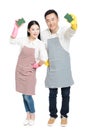 Man and woman holding cleaning supplies Royalty Free Stock Photo