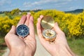 Man and woman holding compasses Royalty Free Stock Photo