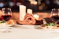 Man And Woman Holding Hands On Table In Restaurant, Closeup Royalty Free Stock Photo