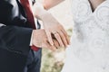 Man and woman holding hands. wedding rings bride and groom Royalty Free Stock Photo