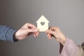 Man and woman holding house model Royalty Free Stock Photo