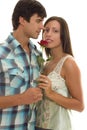 Man Woman holding single red rose