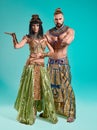 The man, woman in the images of Egyptian Pharaoh and Cleopatra Royalty Free Stock Photo