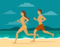 Man and Woman jogging together on the beach. Royalty Free Stock Photo