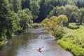 Man and woman in kayak at river Ourthe near La Roche-en-Ardenne, Belgium Royalty Free Stock Photo