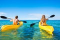 Man and Woman Kayaking in the Ocean Royalty Free Stock Photo